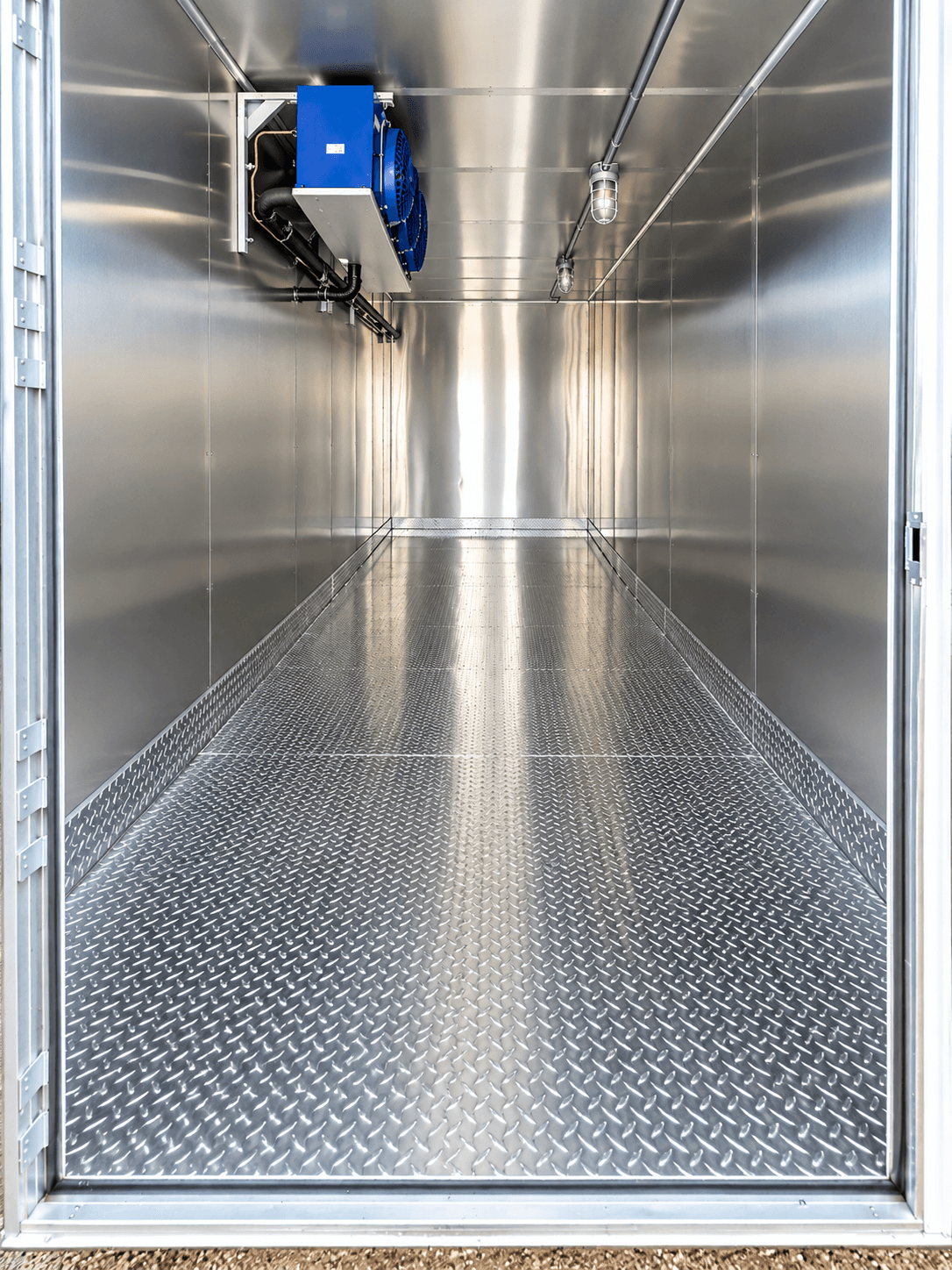 Refrigerated storage interior with a wall-mounted cooling unit